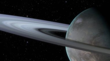 Geceleri uzayda çekilen Satürn halkalarının ve karanlık tarafın nefes kesici görüntüsü yıldızlı arka plandaki görkemli halkaları vurguluyor.