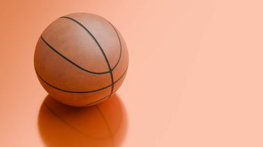 Tek kahverengi basketbol topu parlak turuncu bir yüzeye uzanıyor, deseni görünür, oyunun hayranları için davetkar bir atmosfer yaratıyor..