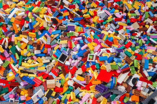 Billund, Denmark - 17 June 2023: Multi-colored plastic Lego brick background