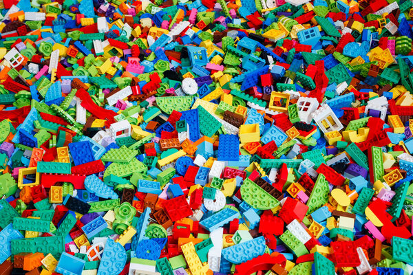 Billund, Denmark - 17 June 2023: Multi-colored plastic Lego Duplo brick background
