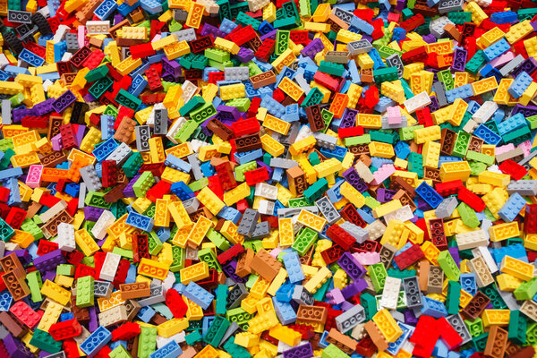 Billund, Denmark - 17 June 2023: Multi-colored plastic Lego brick background