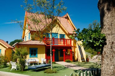 VIMMERBY, SWEDEN - 14 June 2023: Theme park Astrid Lindgren's World, Pippi Longstocking's house Villa Villekulla. clipart