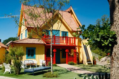 VIMMERBY, SWEDEN - 14 June 2023: Theme park Astrid Lindgren's World, Pippi Longstocking's house Villa Villekulla. clipart
