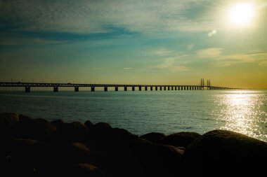 Oresund Bridge on sunset, between Sweden and Denmark, Malmo clipart