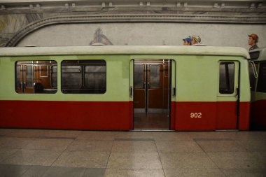 A subway train waits for passengers in Pyongyang, North Korea clipart