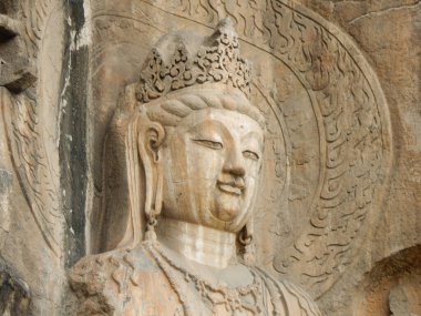 Buddhist Statue at Longmen Grottoes in Henan Province clipart