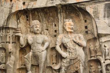 Buddhist Rock Carvings at Longmen Grottoes in Luoyang, China clipart