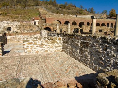 Preserved Roman Floor Mosaic and Arch at Heraclea Lyncestis in Macedonia clipart