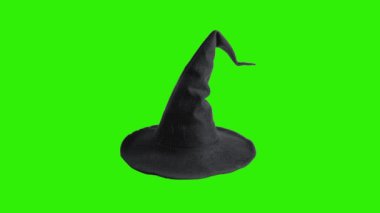 Cadı şapkası Cadılar Bayramı kağıt katlama durdurma hareketi yeşil ekranda izole