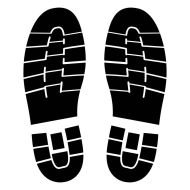 Bu resim, lastik desenli iki siyah ayakkabı izi gösteriyor. Beyaz bir arkaplanda ileri ve izole bir şekilde, güçlü bir görsel yaratıyorlar..