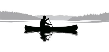 Uzak Dağlarla Suda Kano süren İnsanoğlunun Silueti