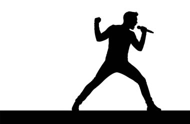 Mikrofona Yüksek Sesle Şarkı Söyleyen Bir Kişinin Silueti