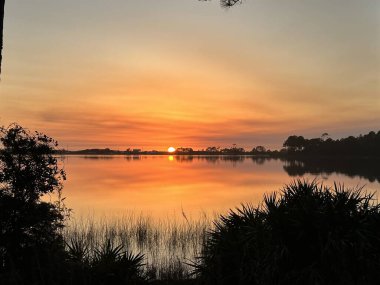 Florida 'daki kum gölünde gün batımı