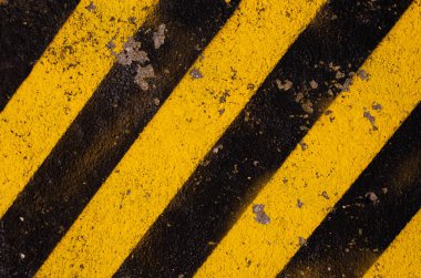 Grunge sarı ve siyah köşegen çizgileri. Endüstriyel uyarı geçmişi, uyarılar, inşaat, güvenlik. Yüksek kalite fotoğraf