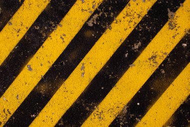 Grunge sarı ve siyah köşegen çizgileri. Endüstriyel uyarı geçmişi, uyarılar, inşaat, güvenlik. Yüksek kalite fotoğraf