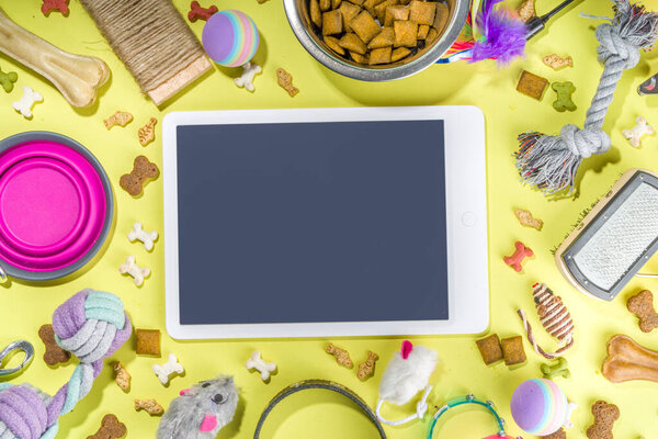 Pet food and accessories, various cat, dog, domestic animals food, toys, treats, utensils. Zoomarket and pet store, online shopping, pet care concept, flatlay banner top view copespace