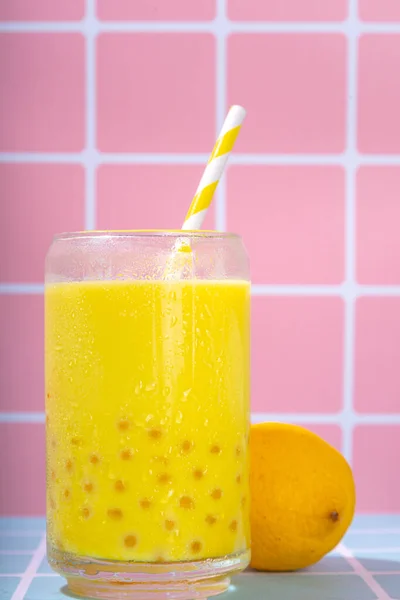 stock image Set of three colorful summer bubble tea, bright creamy pearl tea or latte tapioca drinks, pink berry, yellow citrus, green mint, with tapioca balls and crushed ice, on colorful tile background