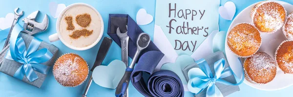 Father\'s day holiday greeting card. Father\'s Day morning breakfast with cute surprise background, with gift boxes, cupcakes, coffee mug, heart decor, tools and ties, Happy Father\'s Day letter