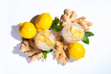 Refreshment Ginger Ale cocktail, Kombucha or Lemon Ginger iced lemonade drink. Sweet and sour alcohol drink copy space