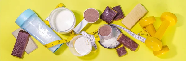 Set of protein bar, shake cocktail and powder. Healthy sport and fitness energy protein snacks, sport nutrition