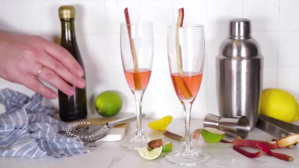 Rhubarb Champagne Fizz Cocktail Summer Cold Alcohol Drink Champagne Glasses — Stock Video
