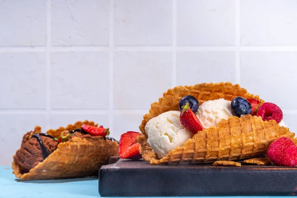 stock image Various sweet taco ice creams. Waffle taco shells with chocolate and vanilla flavour ice cream with different fruits, berry, toppings