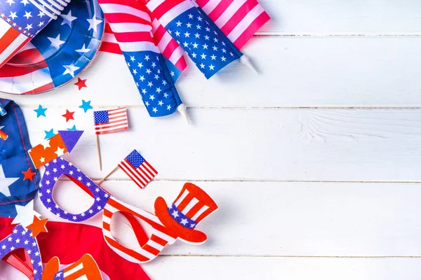 stock image Happy Labor Day, Presidents Day, Fourth of July Independent Day, Memorial day, Columbus day background. White wooden background with USA flag color paper fans and decorations, party accessories