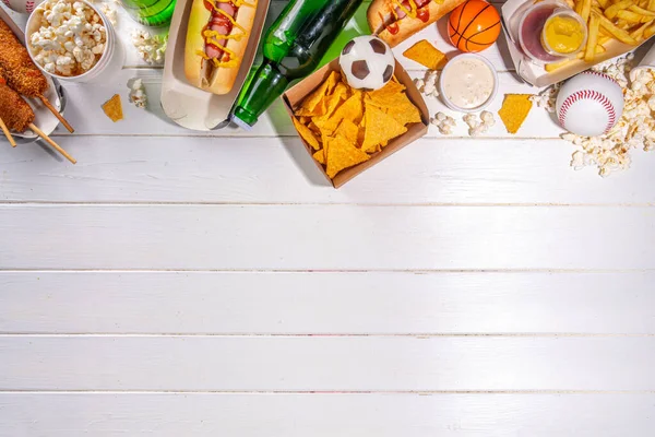 stock image Traditional sport stadium foods and beer background, Set of various baseball, basketball, football fans and stadium snacks, chips, sauces, hot dogs with beer bottles and fan accessories 