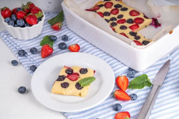 stock image Mixed Berry Sheet Pan baked Pancakes, simple idea recipe. with fresh blueberry and strawberry, copy space