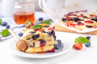 Mixed Berry Sheet Pan baked Pancakes, simple idea recipe. with fresh blueberry and strawberry, copy space clipart