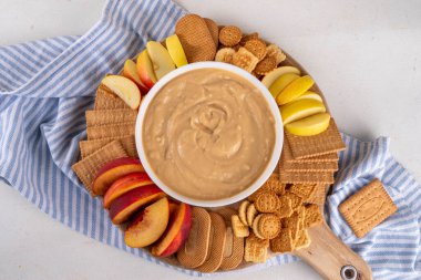 Balkabağı kabağı kabağı, balkabağı baharatlı mus, kurabiye, meyve, sonbahar için aperatif panosunda kraker, Şükran Günü partisi. Vanilyalı puding, tereyağı, baharatlı ev yapımı balkabağı püresi.