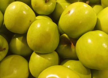 Fresh, crisp green apples ready to be enjoyed! Packed with fiber and vitamins, these apples are perfect for a healthy snack or ingredient in your favorite recipes. clipart