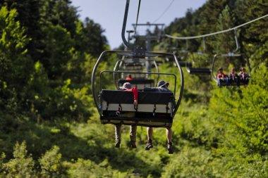 Mechanical chairlift in the Pyrenees France. High quality photo Access to the top of the mountain by ski lift, summer holidays clipart