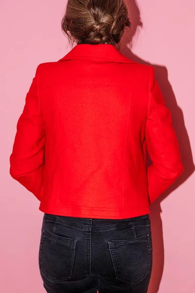 stock image Woman showing the jacket she wants to sell second-hand on a used clothing website.