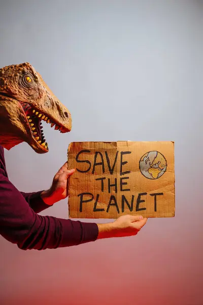 Man Lizard Head Studio Holding Cardboard Sign Says Planet — Stock Photo, Image