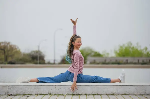 Portrait Girl Doing Rhythmic Gymnastics Outdoors Stok Gambar