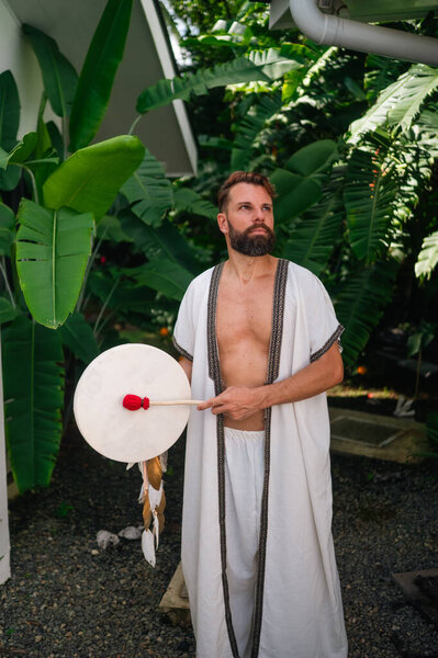 Spiritual healer with shamanic drum