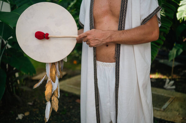 Spiritual healer with shamanic drum