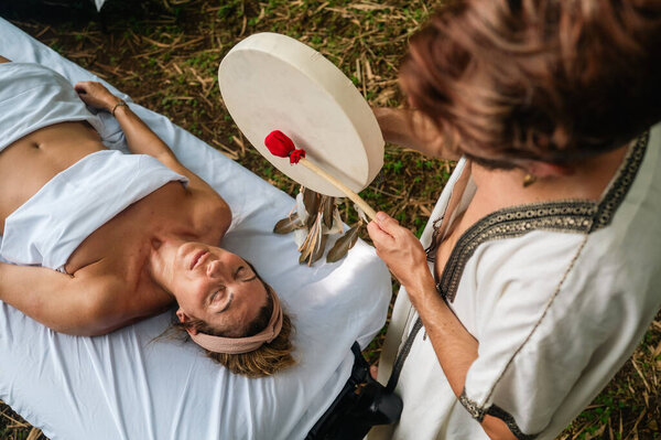 Spiritual healer with shamanic drum