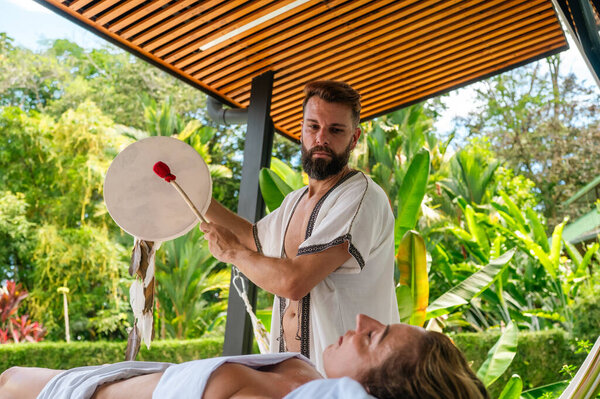 Spiritual healer with shamanic drum