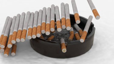 Beyaz arka planda sigara bulunan kül tablası