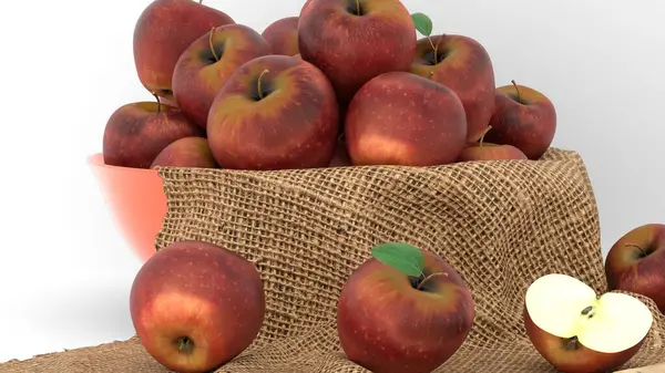 beyaz zemin üzerinde bir sepet elma