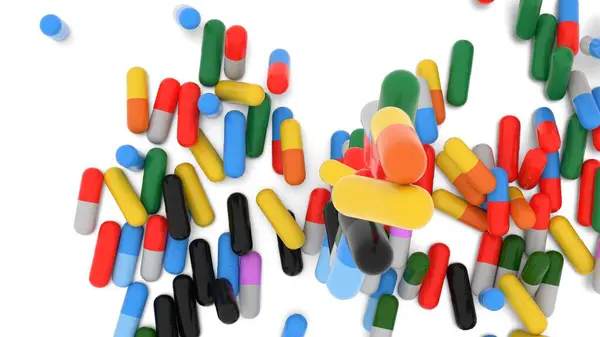 kapsül beyaz arkaplana düşer