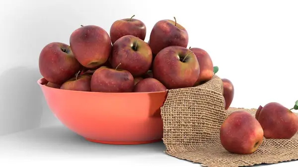 beyaz zemin üzerinde bir sepet elma