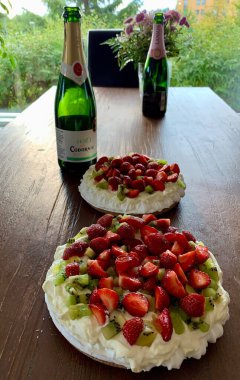 Pavlova Champagne Bottles Festive Setting