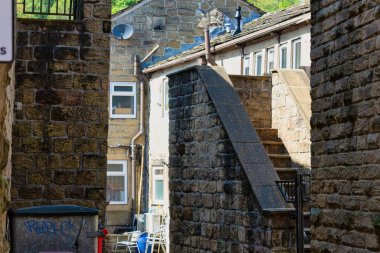 old stone houses in the city in Hebden Bridge - West Yorkshire - Great Britain clipart