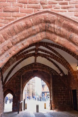 brick wall and enterance of Chester Cathedral - Cheshire - Great Britain clipart