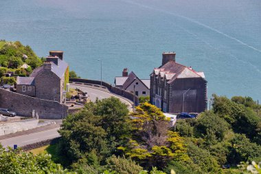 the beautiful view of the sea and town - view from top of mountain in Barmouth- Gwynedd- Wales- Great Britain clipart