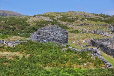 a view of a beautiful scenery of ruined village in Barmouth- Gwynedd- Wales- Great Britain clipart