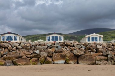 the beach oand mobile houses in Tal-y-bont - Gwynedd - Wales - Great Britain clipart